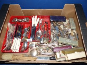 A good quantity of plated cutlery including serving spoons, knives, forks, fish eaters, etc.