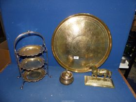 A large brass Charger having allover engravings of animals and birds,