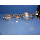 A three piece Silver Teaset including teapot, sucrier and milk jug, London 1900/01,