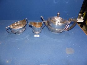 A three piece Silver Teaset including teapot, sucrier and milk jug, London 1900/01,