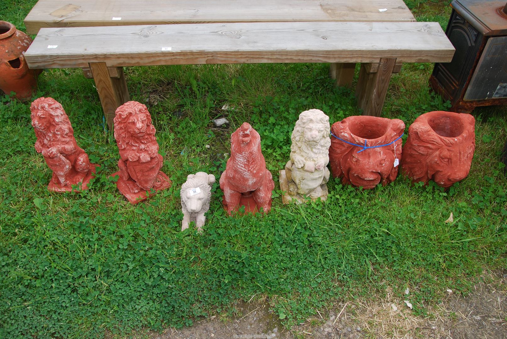 A quantity of concrete garden ornaments, lions etc.