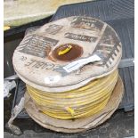 A roll of yellow three core flex/cable. PLEASE NOTE ROLL OF CABLE ONLY.
