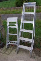 two aluminium step ladders, (one 6 rung and one 3 rung).