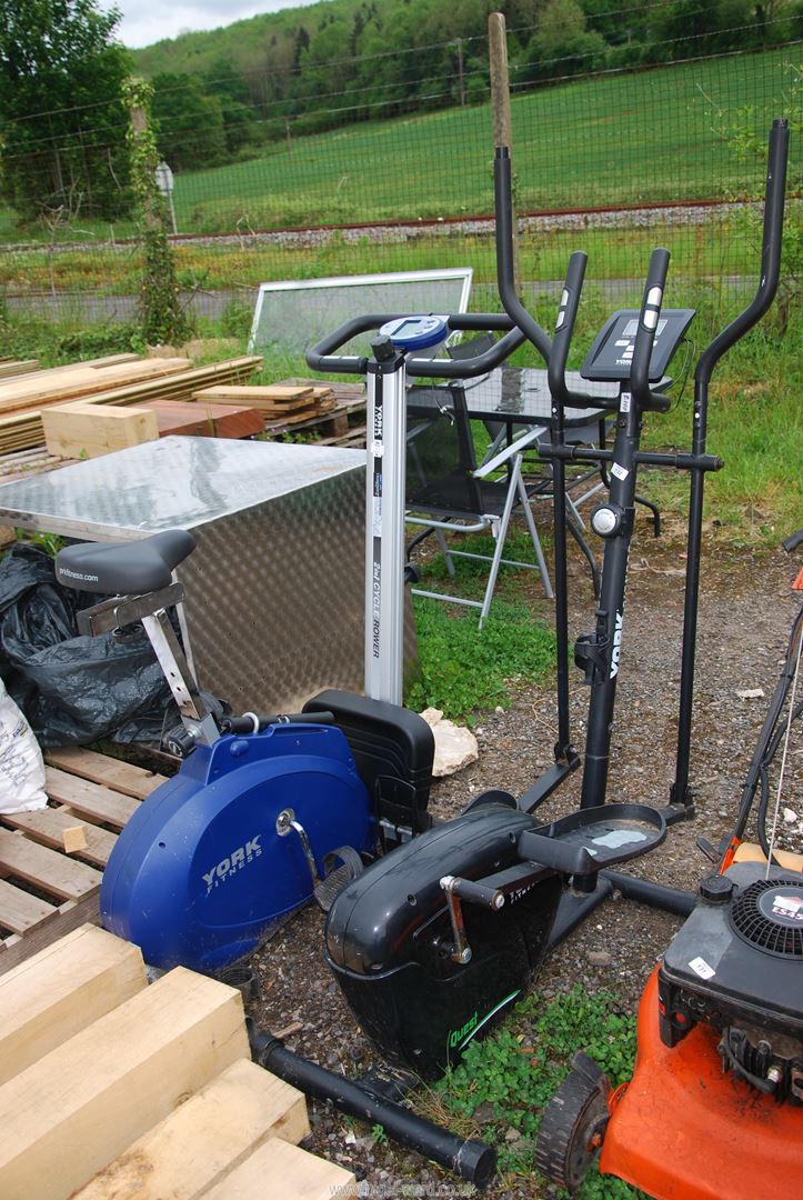 A York Fitness Cross trainer and a York exercise bike.