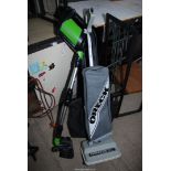 A G-Tech Pro 2" cordless hoover, (no charger) and a "Oreck" upright vacuum cleaner with attachments.