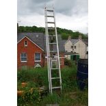 A 11 rung aluminium extending ladder with a stand off.