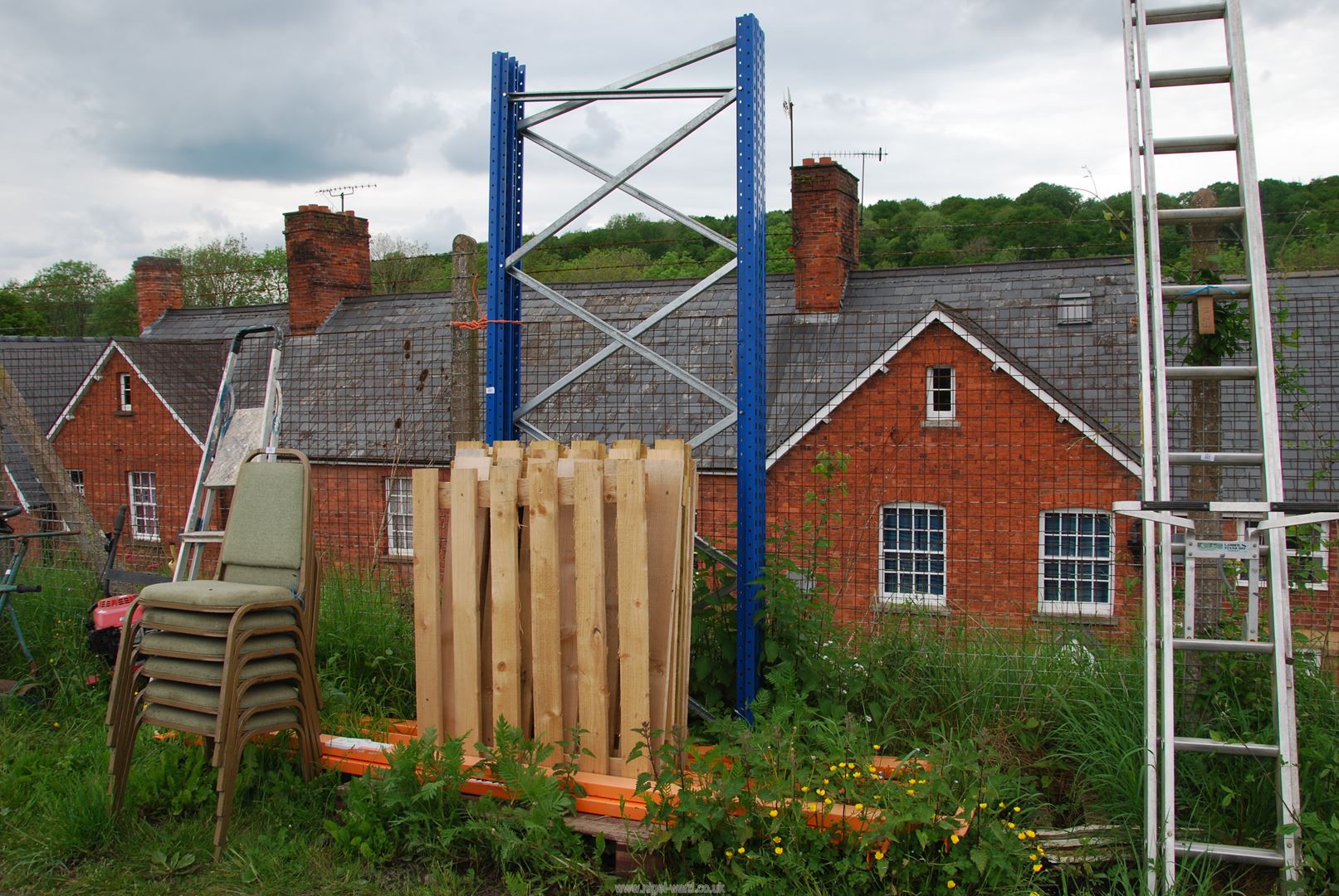 A quantity of industrial racking and shelving including two ends, six beams and nine pallet shelves.