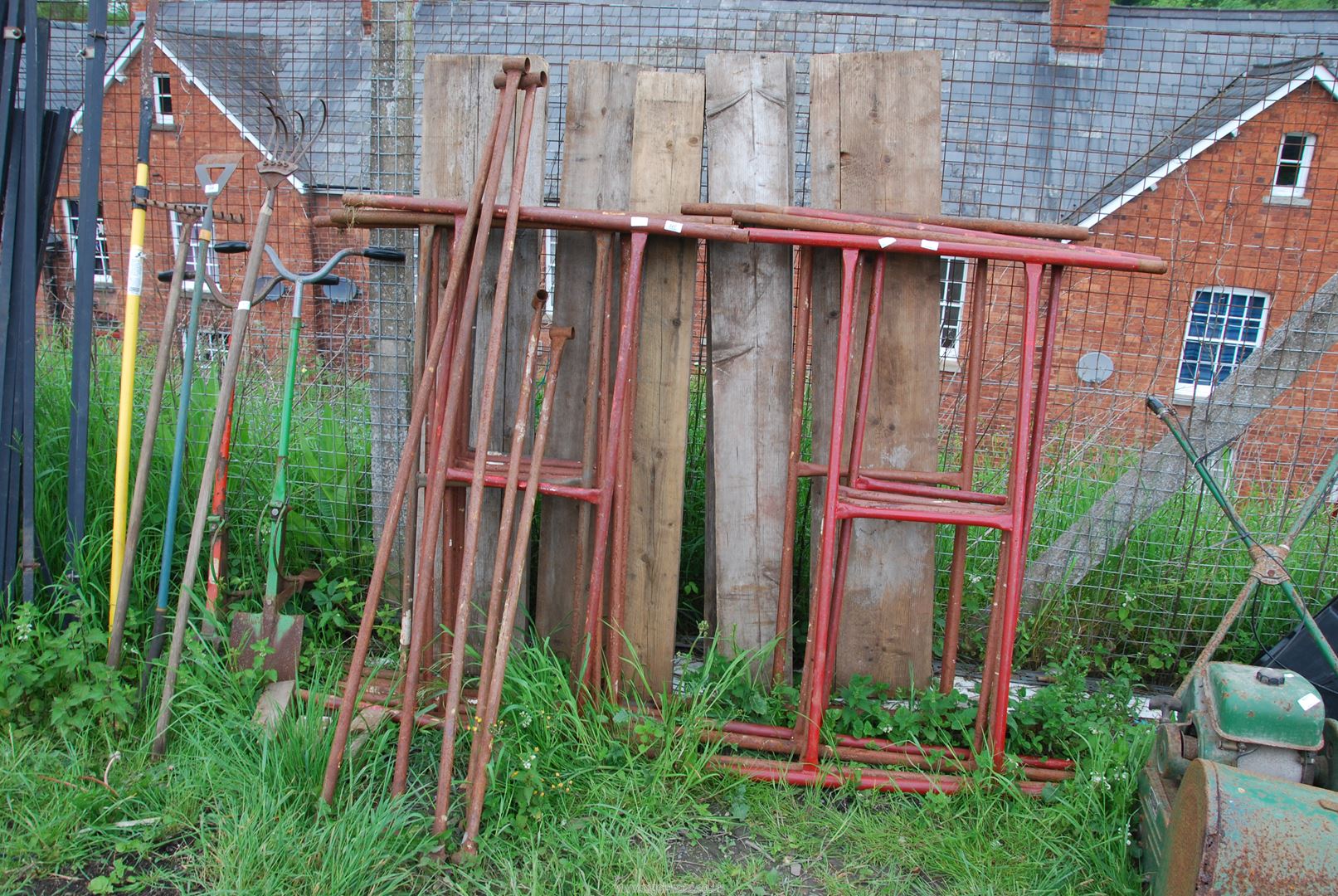 Tower scaffolding with planks.