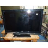 A "Sony Bravia" 40" TV with remote