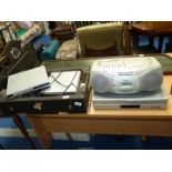 A "Sony"Radio/CD and a "Toshiba DVD player and a DVD players. etc.