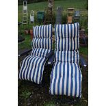 Two Sun loungers with cushions.