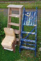 Two wooden step ladders and a quantity of children's chairs.
