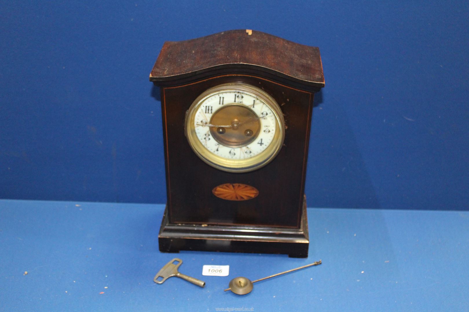 A dome cased Mantle Clock,