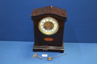 A dome cased Mantle Clock,