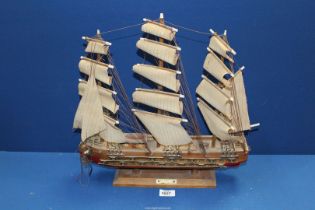 A model of 'Fragata Siglo XVIII' ship on stand with rigging and sail detail, 17" wide x 17" high.