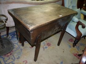 An old mixed woods Dough Trough/Bin having a hinged lid and square legs,