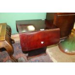 A 1920's Art Deco, surprisingly heavy darkwood drop-leaf Occasional Table,