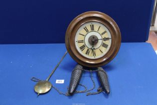 A Postman's Alarm wall clock, circa 1900, manufactured in the Black Forrest, Germany,