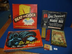 A quantity old games including Snakes & Ladders, Dr Magini, Beat the Clock, dominoes, etc.