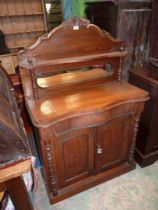 A compact Mahogany Sideboard having a frieze drawer and a pair of opposing drawers below,