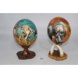 Two "Sherry Rowe" signed hand painted Ostrich Eggs circa 1970/80's, depicting African animals,