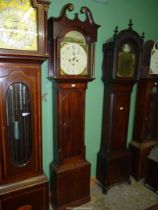 A Mahogany cased Longcase Clock having an arched door and mirrored swan-neck pediment,