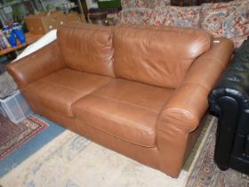 A two/three seater brown upholstered Settee.