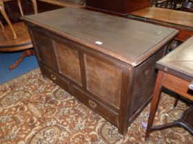 A three panel Blanket Chest/Coffer having a pair of drawers below,