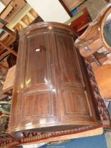 A good quality Cabinet maker made Mahogany bow fronted Corner Cupboard having inlaid shell detail,