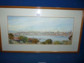 A framed and mounted Watercolour depicting Berwick-on-Tweed, signed lower left M.M. Hay.