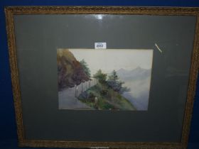 A framed and mounted Watercolour depicting a footpath meandering up a mountain with peaked