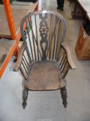 A wooden Grandmother chair.