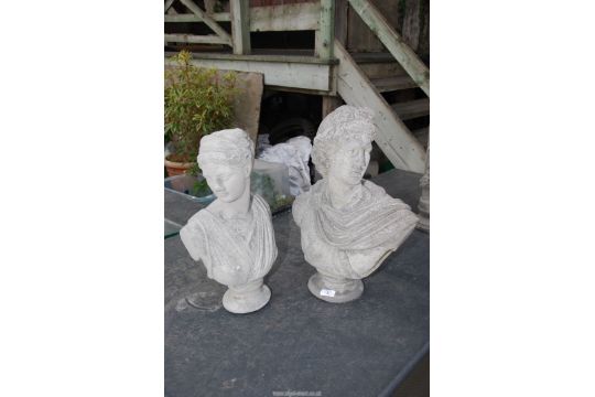 Two concrete busts of ladies, one x 20" high, One x 18" high.