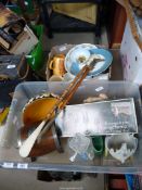 A box of china commemorative ornaments, shoe horn, glass, and a small rum barrel.