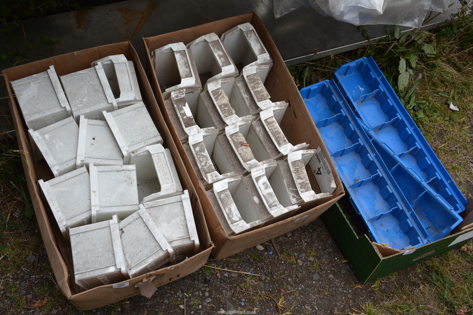 Three boxes of Linbin type trays.