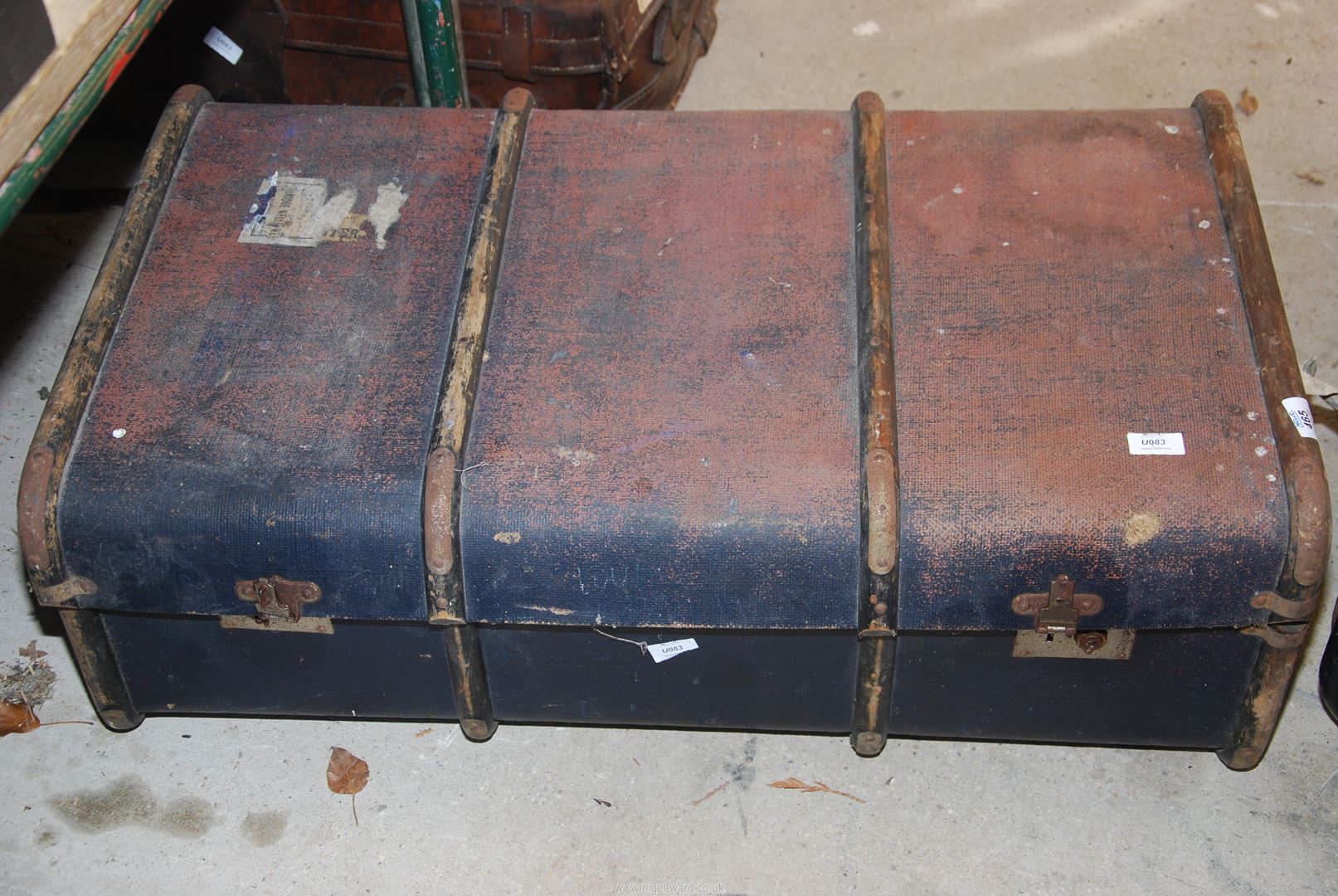 A 1950's bentwood bound Blue travel trunk with striped lining and internal tray.