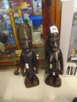 A pair of African figures