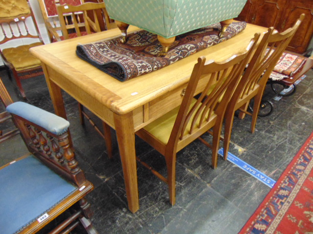 An Oak two drawer writing table