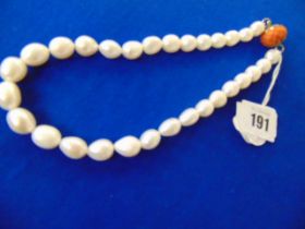 A Georgian Pearl necklace with Coral clasp with large Fresh water Pearls
