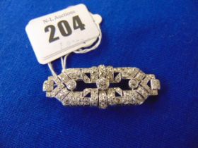 A PLatinum brooch set with Diamonds, 5cm length, approx.