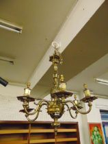 A brass six branch chandelier