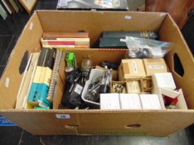 A box of vintage radio valves and a book on radio