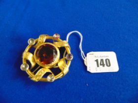 An 18ct Gold brooch with Citrine centre and other stones, 26 grams total weight, measures 5.