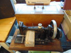 A Singer sewing machine in case