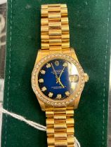 18ct Gold Rolex, Diamond bezel, blue Diamond dial watch, in working order,