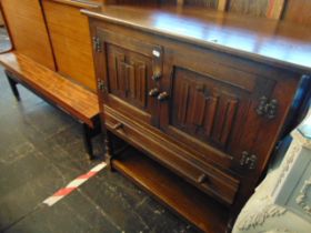 An linen fold cupboard