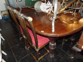 An extending Mahogany dining table