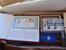 A qty of first day covers and coins sets