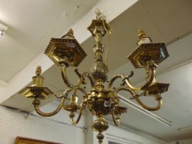 A brass six branch chandelier