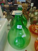 A pair of 5 litre glass carboys